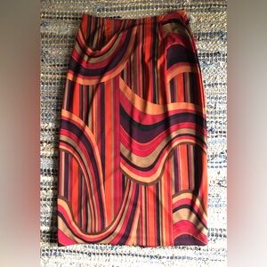 VINTAGE 80’s Vibrant Multi-Stripe Red/Orange Maxi Skirt
Clio ( brand) 
Size M